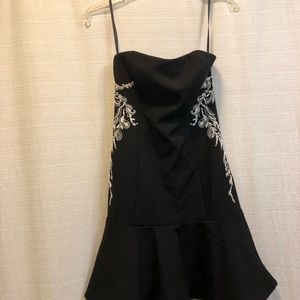 NWT - WHBM Strapless and embellished LBD with flounce bottom. Size 2. Stunning.